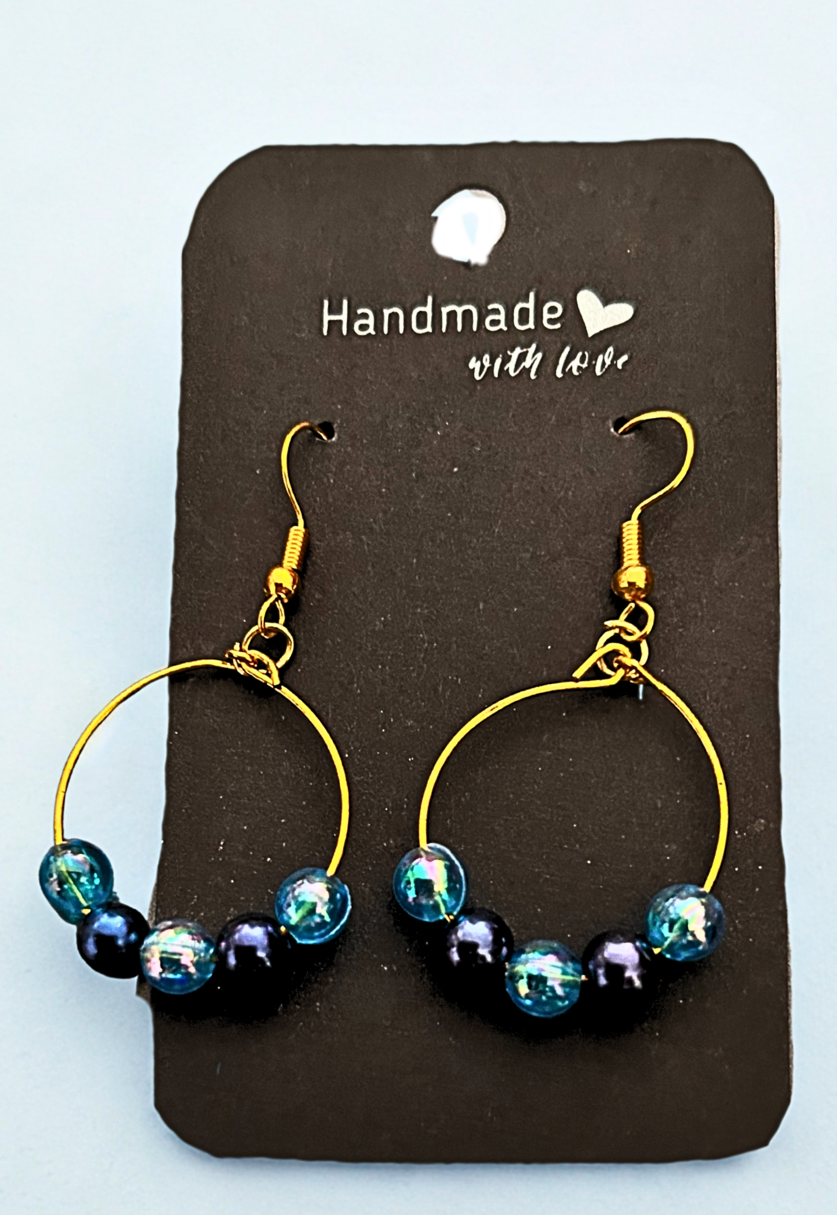 Gold-plated blue beaded hoop earrings