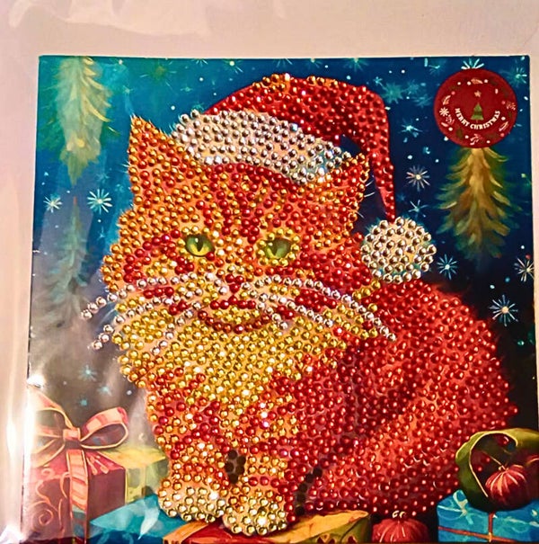 Ginger kitten with presents Christmas card