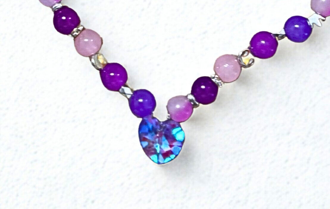 Hypoallergenic Silver -plated multi-purple beaded necklace with a blue glass heart charm