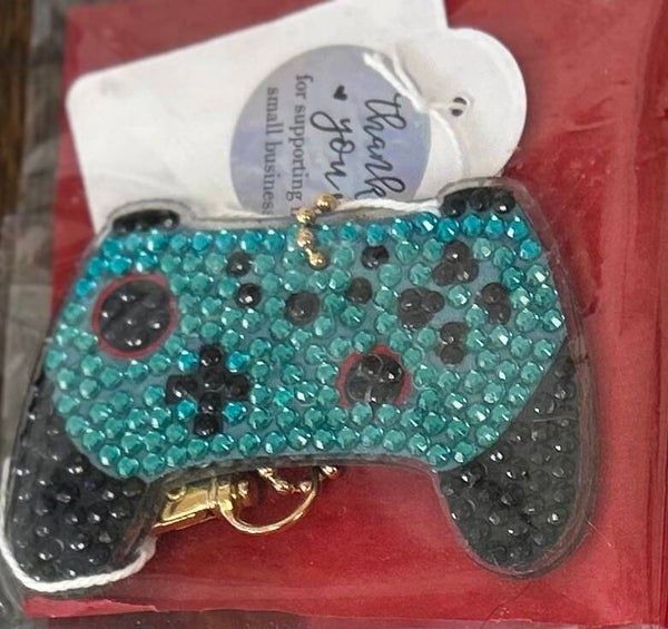 Diamond-painted green and black PlayStation 2 controller
