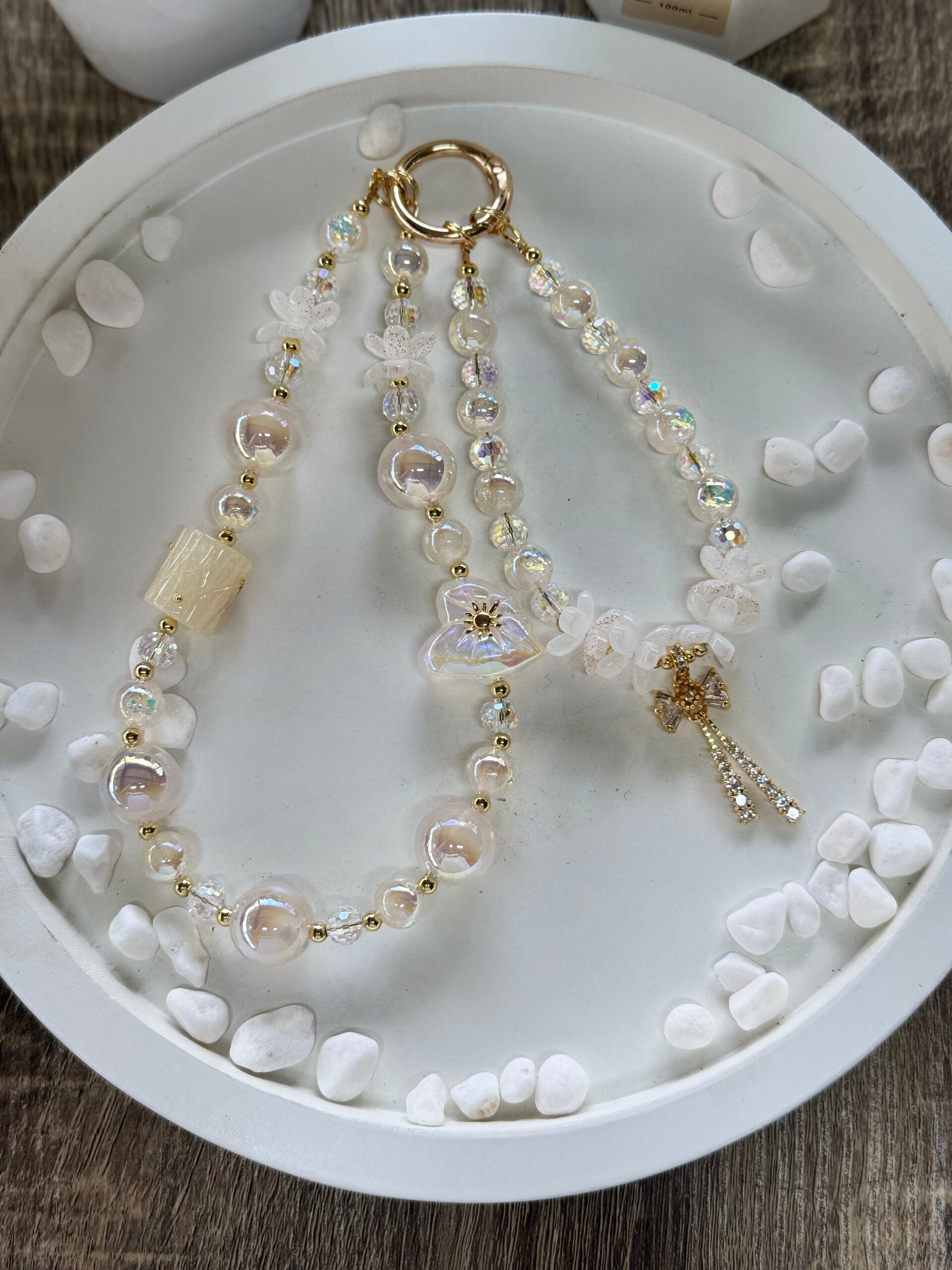 Iridescent Beaded Phone Charm Strap With Butterfly And Bow Charms