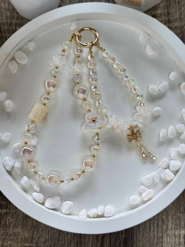 Iridescent Beaded Phone Charm Strap With Butterfly And Bow Charms