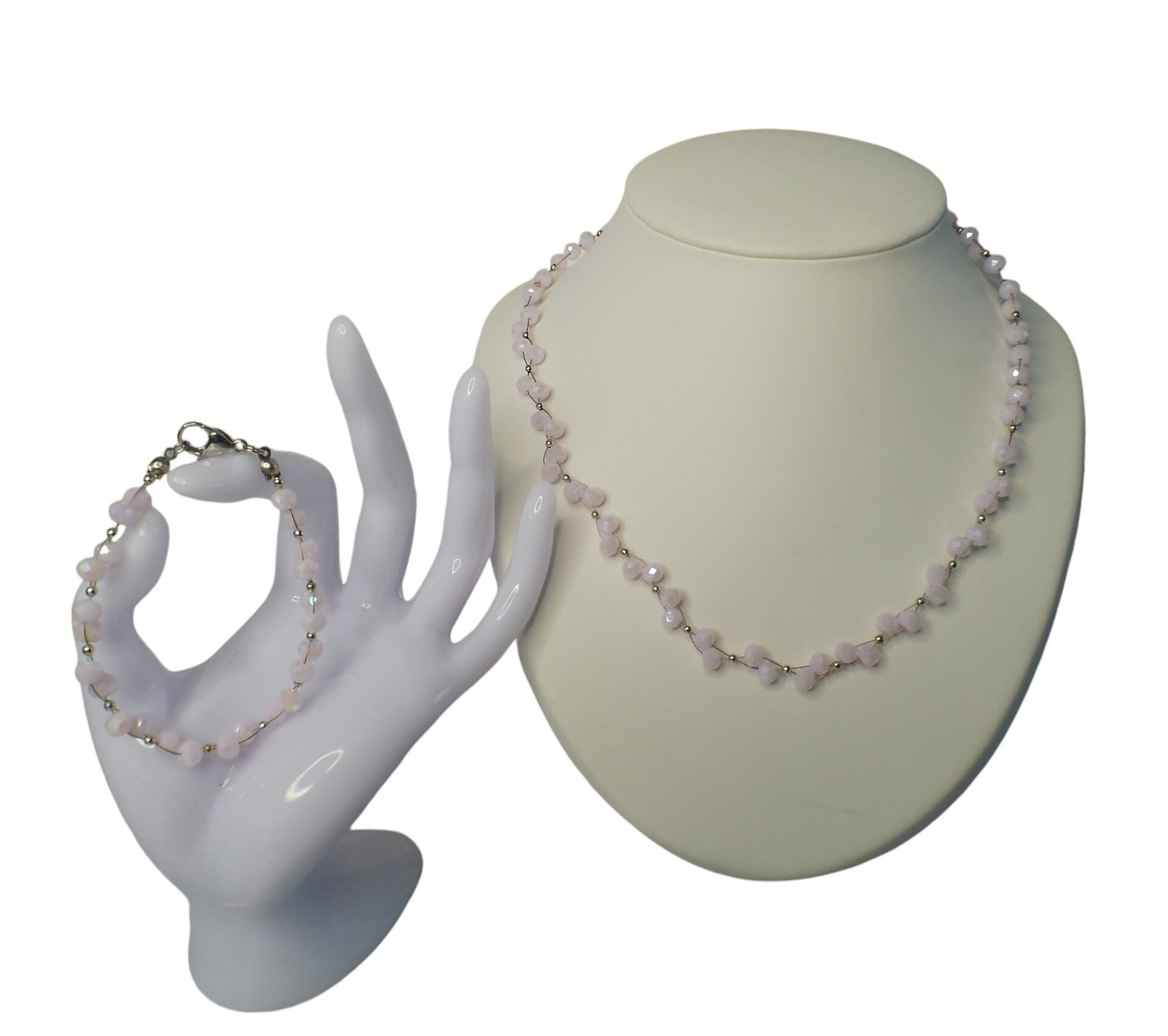 Zilveren stainless steel ketting en armband met dubbele rij roze kralen