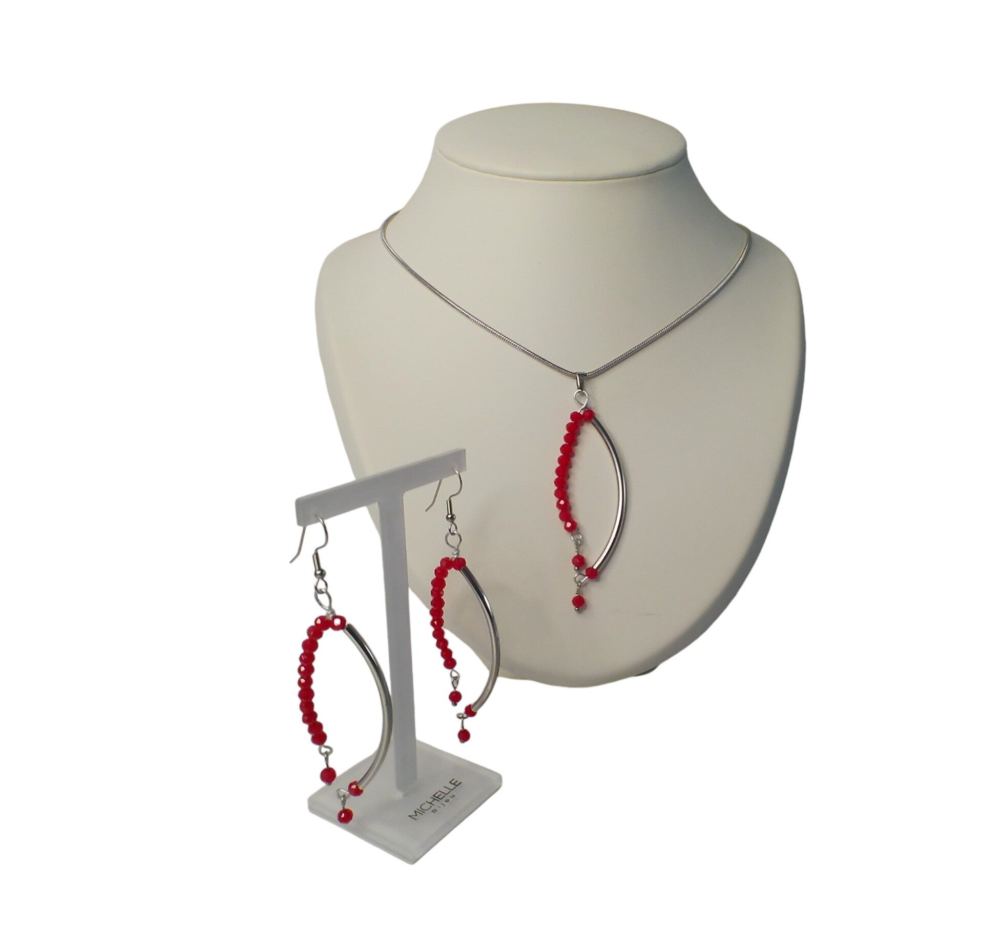 Zilveren snake ketting en oorbellen met rode kralen