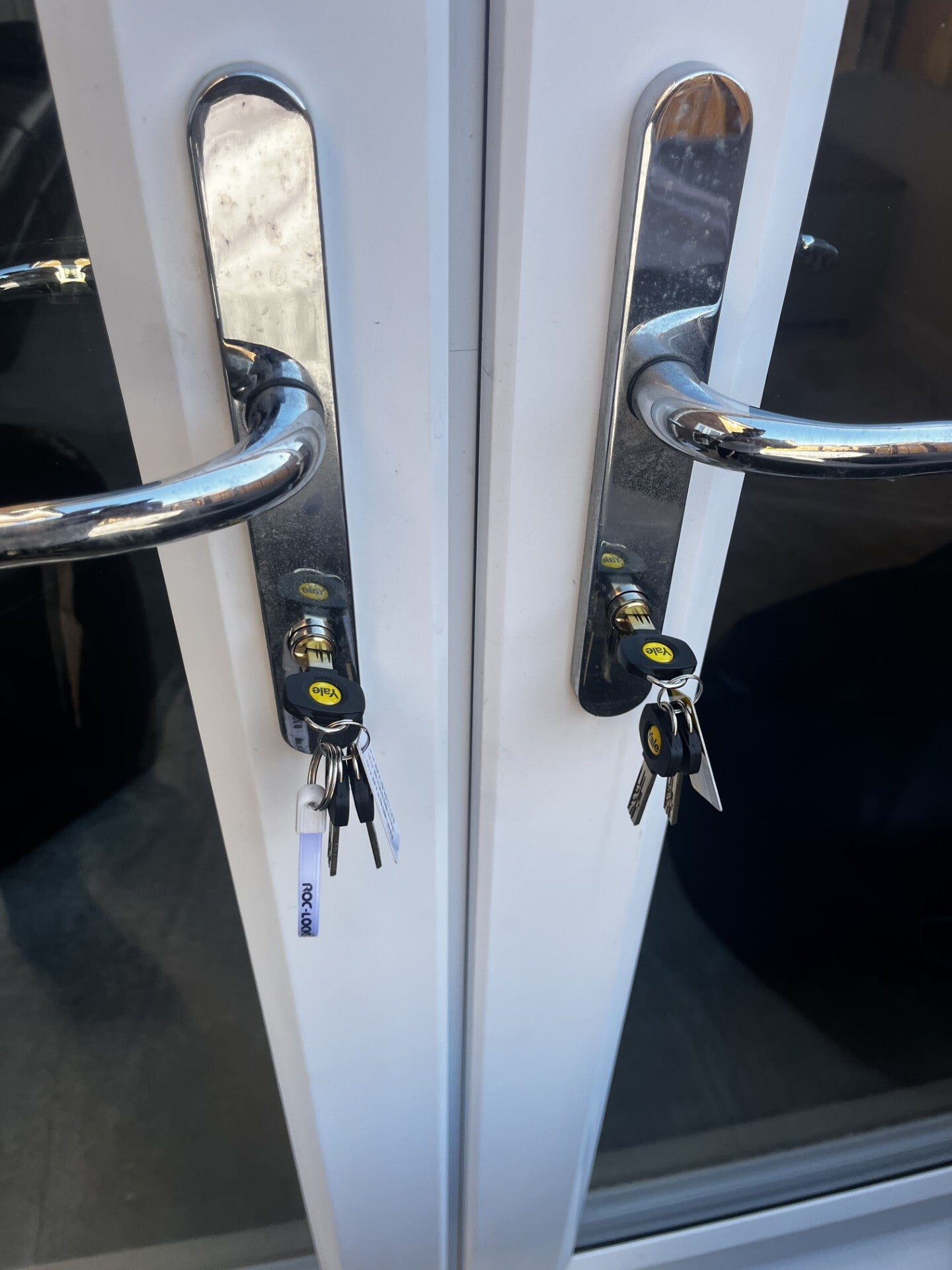 Picture of double uPVC doors both with keys in the locks