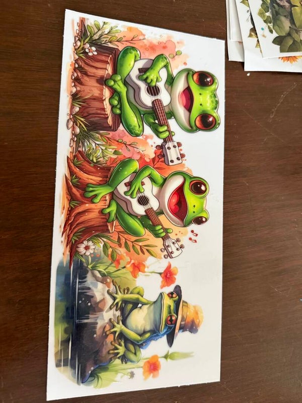 Frogs playing the guitar