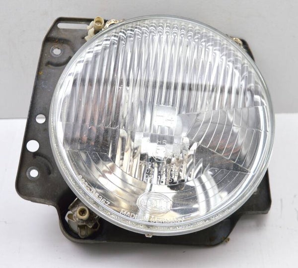 Hella H4 inbouwkoplamp met stadsverlichting voor VW Golf MK2