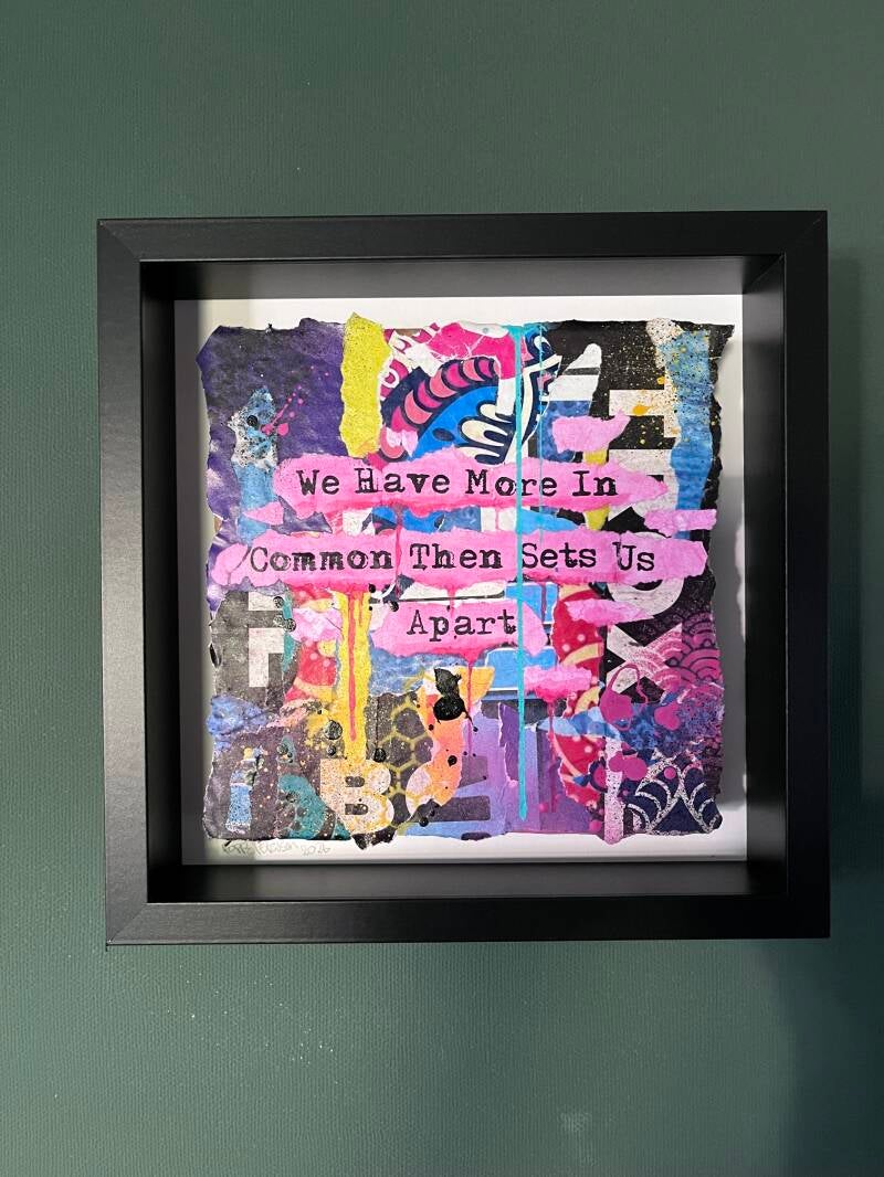 "We Have More In Common Then Sets Us Apart"  2026, 25x25cm Mixed Media op Cardboard met zwarte baklijst