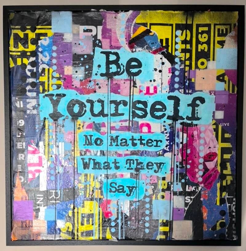 "Be Yourself No Matter What They Say" 2026, 95x95cm Mixed Media op Cardboard in zwarte baklijst.