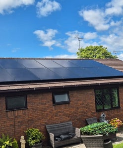solar installer on roof