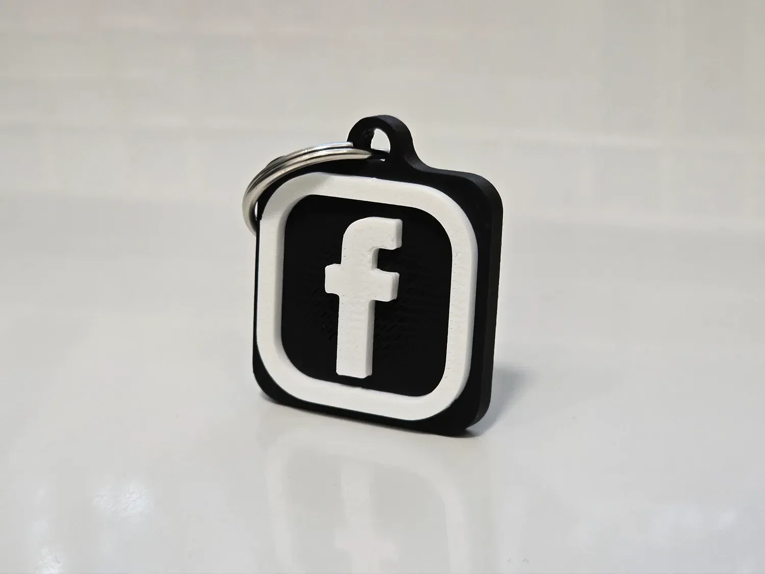Llavero Tag NFC con logotipo de Facebook