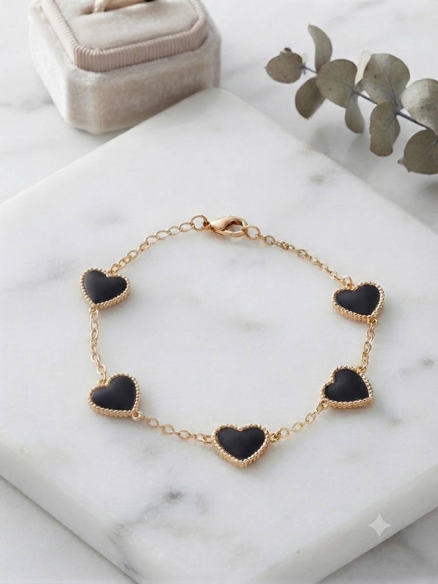 Bracelet black hearts gold
