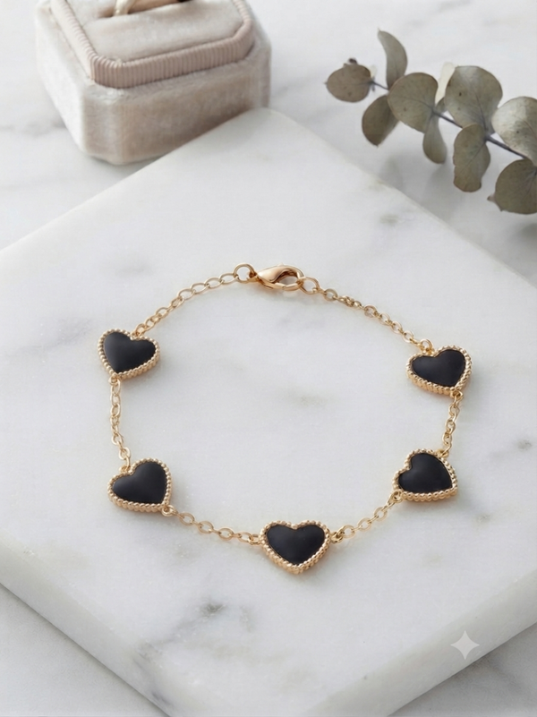 Bracelet black hearts gold