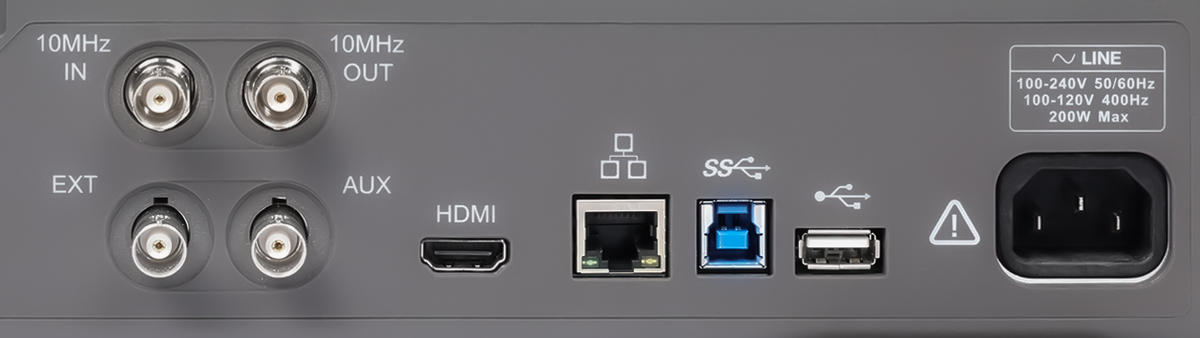 Close-up of the SDS5000X HD rear panel: 10 MHz in and out, EXT, AUX, HDMI, LAN, USB device, USB host and mains inlet