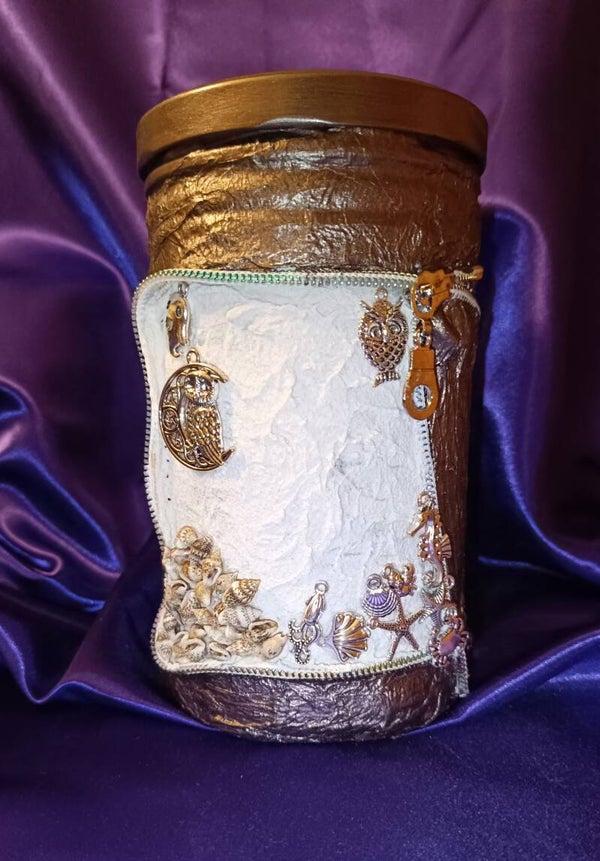 Schraubglas mit  Sand und Muscheln