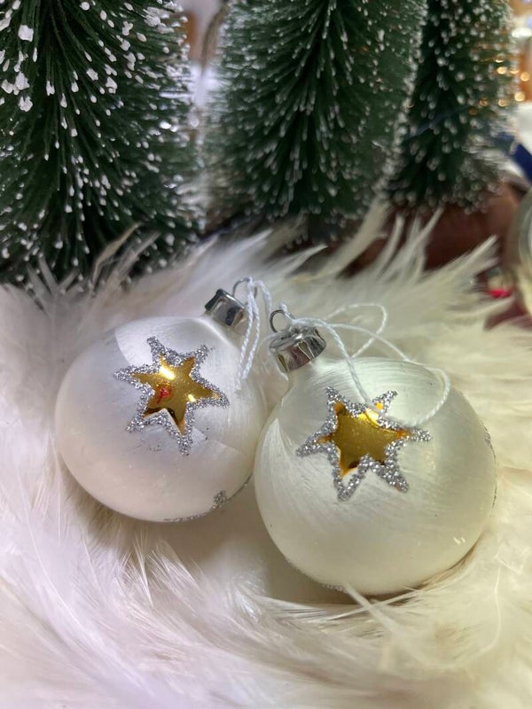 X Balletje wit met gouden sterren