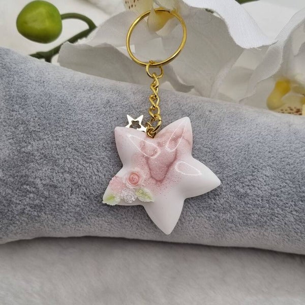 Porte clé étoile blanche et rose poudrée 23