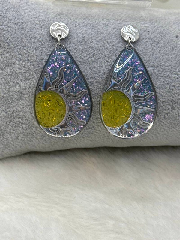 Boucles d’oreilles grandes goutte et son soleil 67