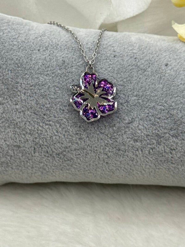 Pendentif hibiscus violet pailleté 69