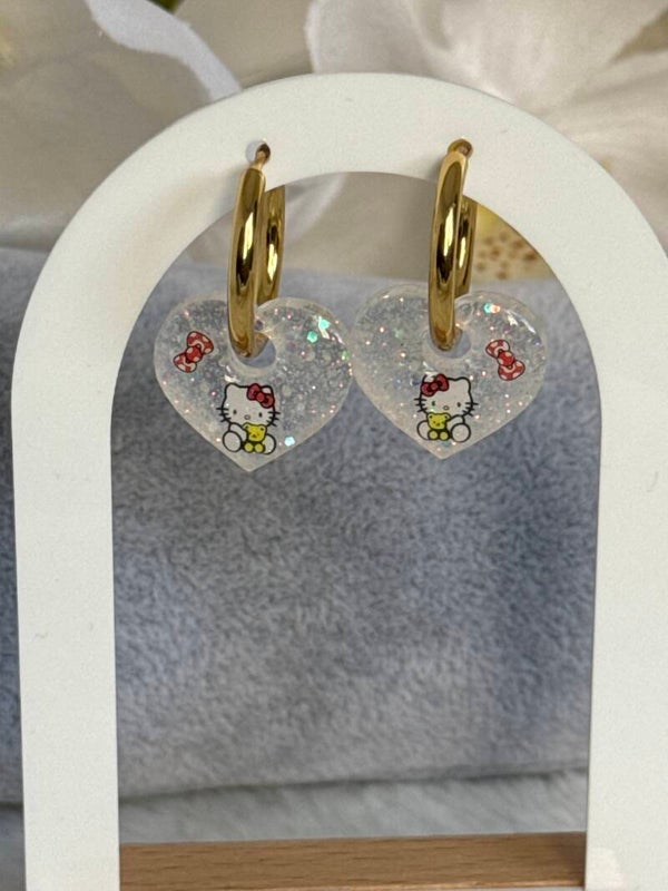 Boucles d’oreilles pampilles cœur hello kitty flot rouge 52