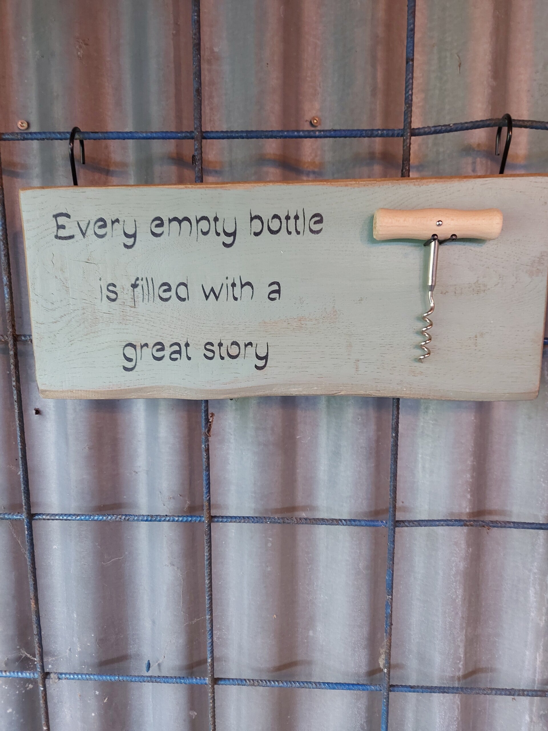 Wijnopener " Every empty bottle"