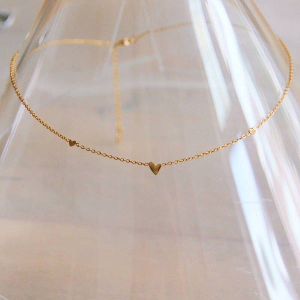 Edelstalen fijne ketting met 3 mini hartjes | Goud
