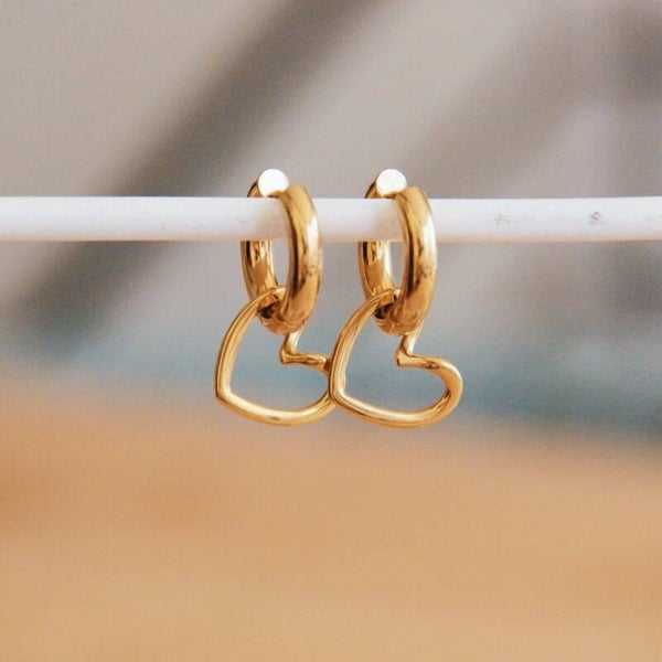 RVS brede oorbel met open hart - goud