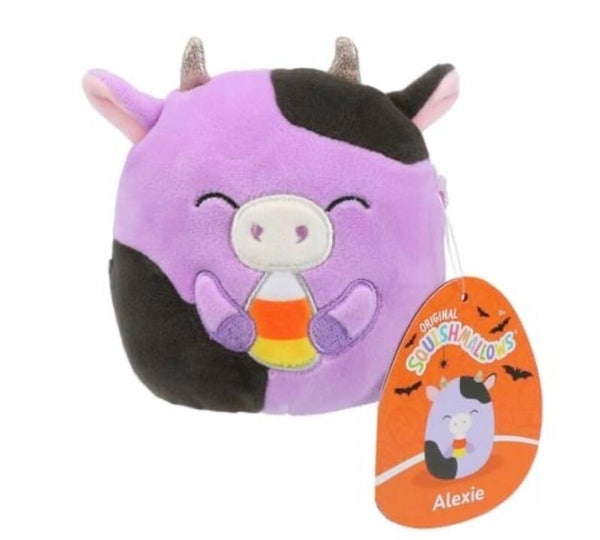 Squishmallows Halloween Squad Alexie the Purple Cow with a Candy Corn plush toy