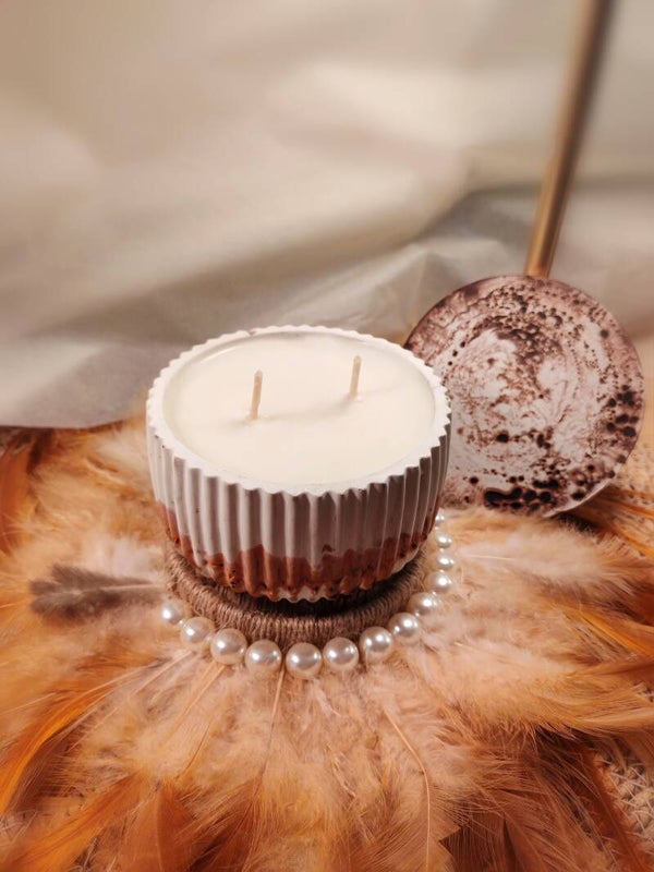 Bougie effet vache avec son couvercle parfum patchouli