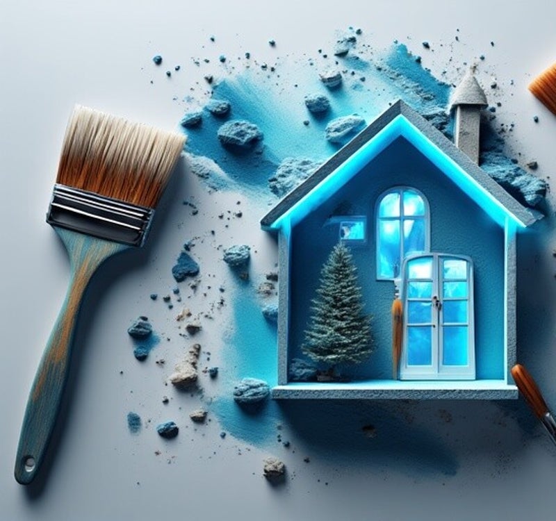 house graphic with paint brushes