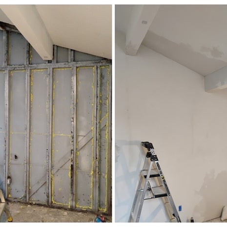 bare studs. during constrcution of water damage living room remodel