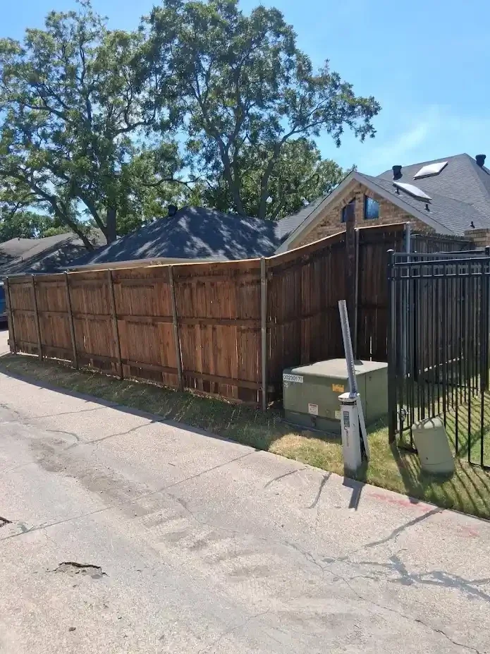fence reparied and stained