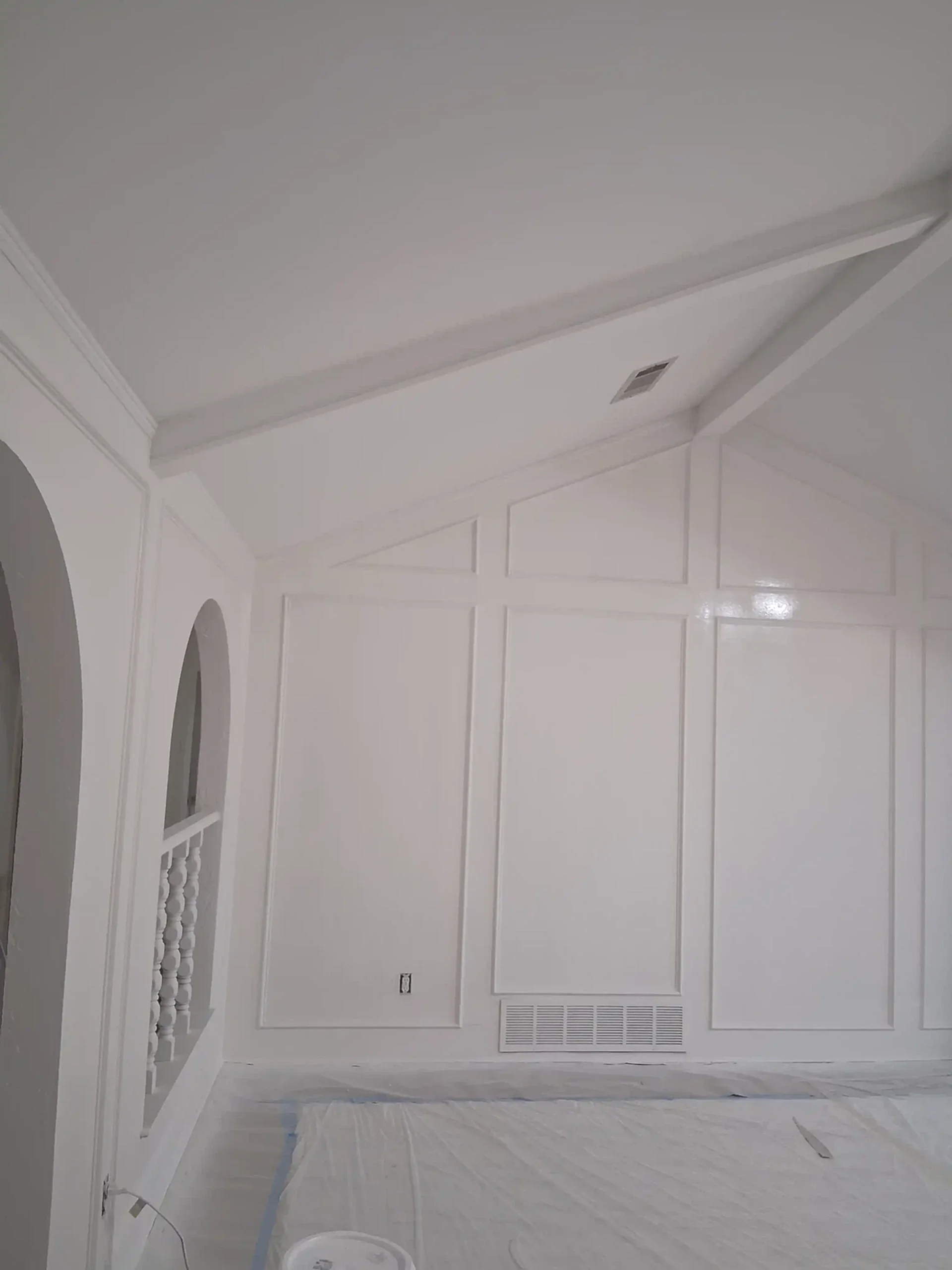 after painting wood panel wainscot living room and smoothing ceilings 