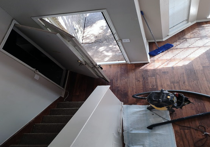 view from upstairs, shop vacuum and floor covering for interior painting services by house painters near me for perfect drywall installations