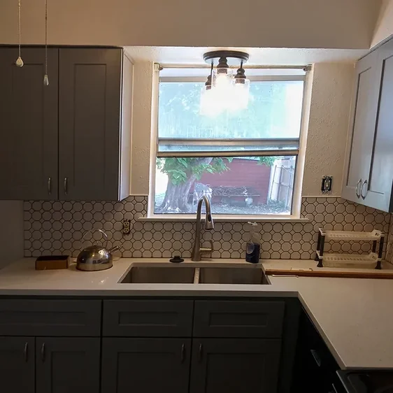kitchen makeover. cabinets installed, new backsplash, new paint by dallas house painters house painting triforce
