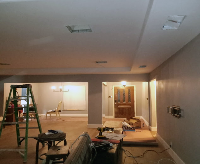 Living room and dining room renovation after drywall flood damage