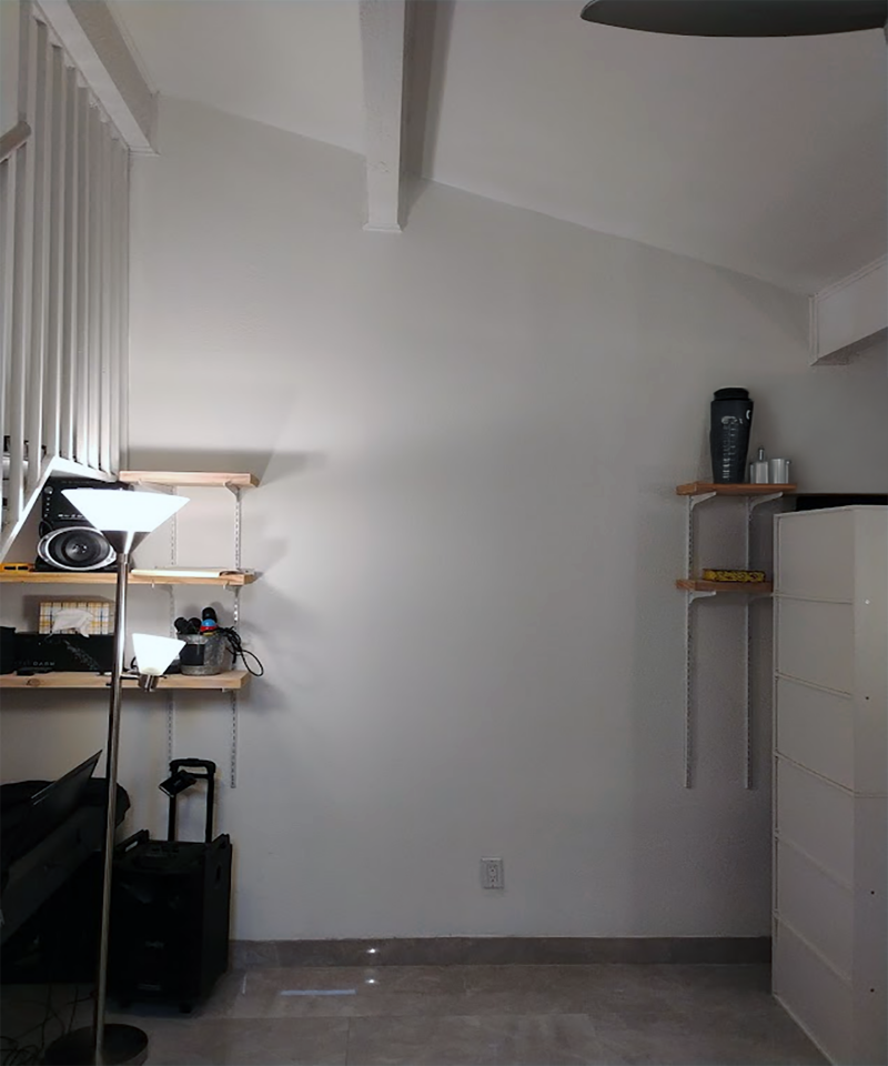 Living room wall back to normal after disastrous water damage and mold mitigated