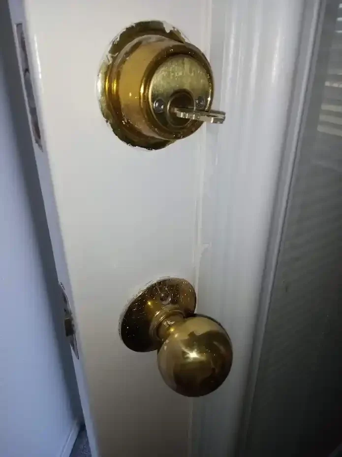 old dirty door handle and deadbolt