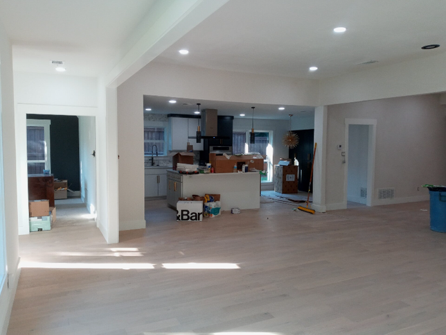 Professional House painting finishes in living room, dining, room , drywall, door frame, cabinets,white interiors