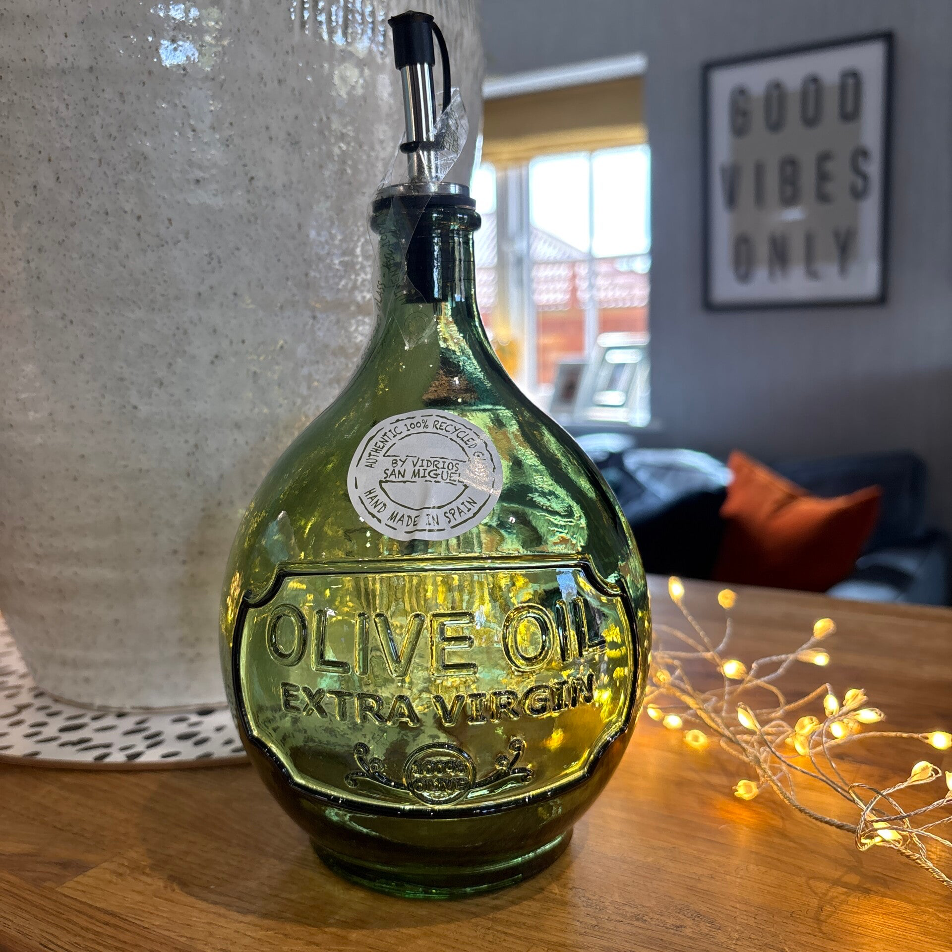 Green Spanish olive oil bottle