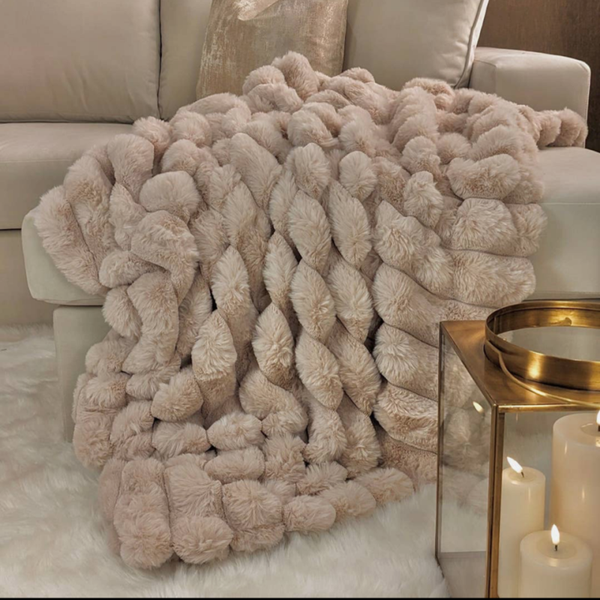 Isla oatmeal faux fur throw.