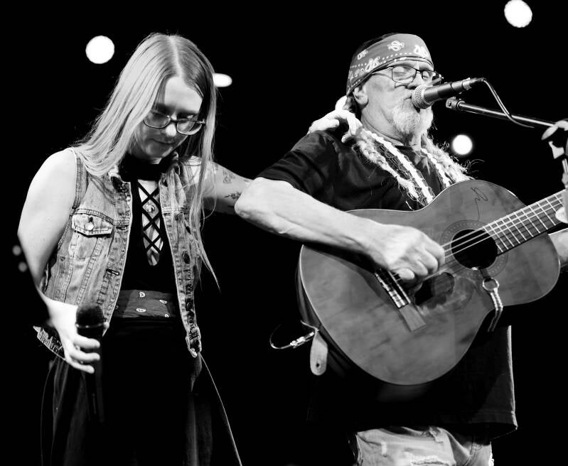 Dan Thompson and Danielle Thompson performing together in On The Road Again – Willie Nelson Tribute