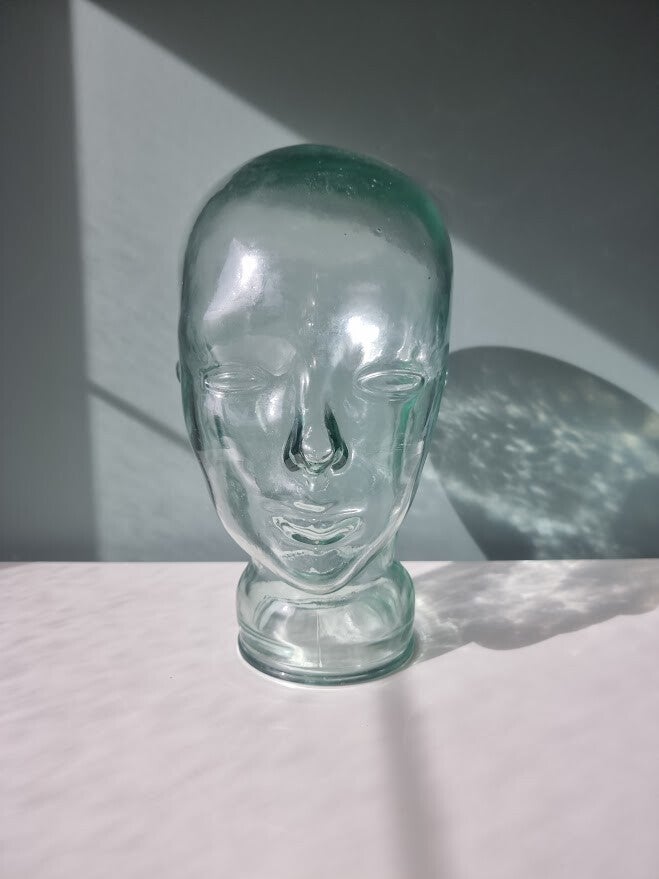 Glazen mannequin hoofd