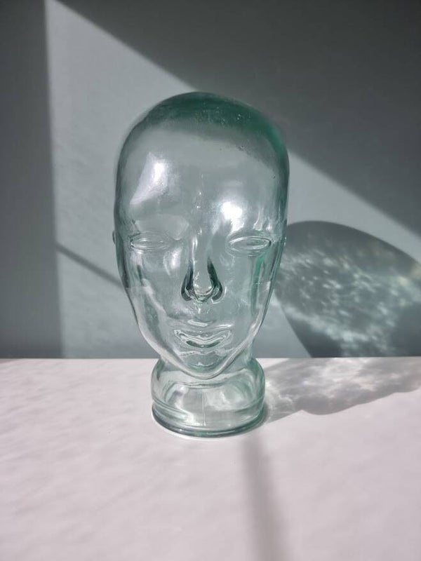 Glazen mannequin hoofd