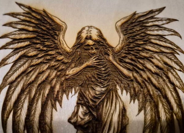 Embossed, mirrors, metal, wood, 300 plus materials for laser engraving. Graphic Desing T-shirts from your imagination. To your reality..