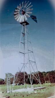 A 16' Aeromotor windmill mounted on a 50' toweer. I installed this windill in the summer of 2001.