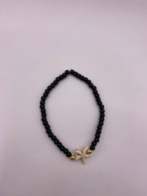Zwart armbandje met zeester