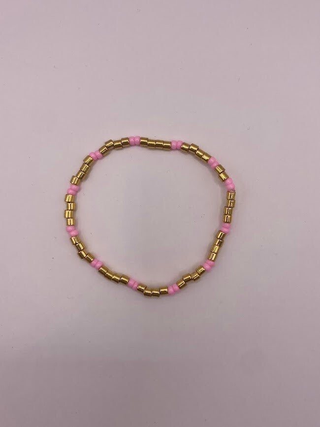 Armbandje goud/roze