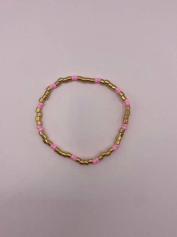 Armbandje goud/roze