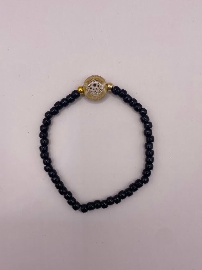 Armbandje zwart taupe
